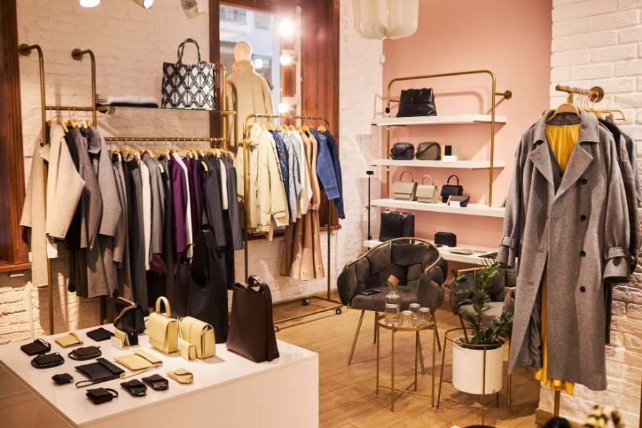 A boutique display highlighting the implications of fast fashion harm within the retail industry.